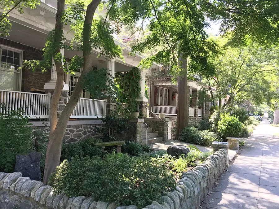 View of Macomb Street homes and sidewalks